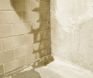 Water seeping through basement cinder block walls