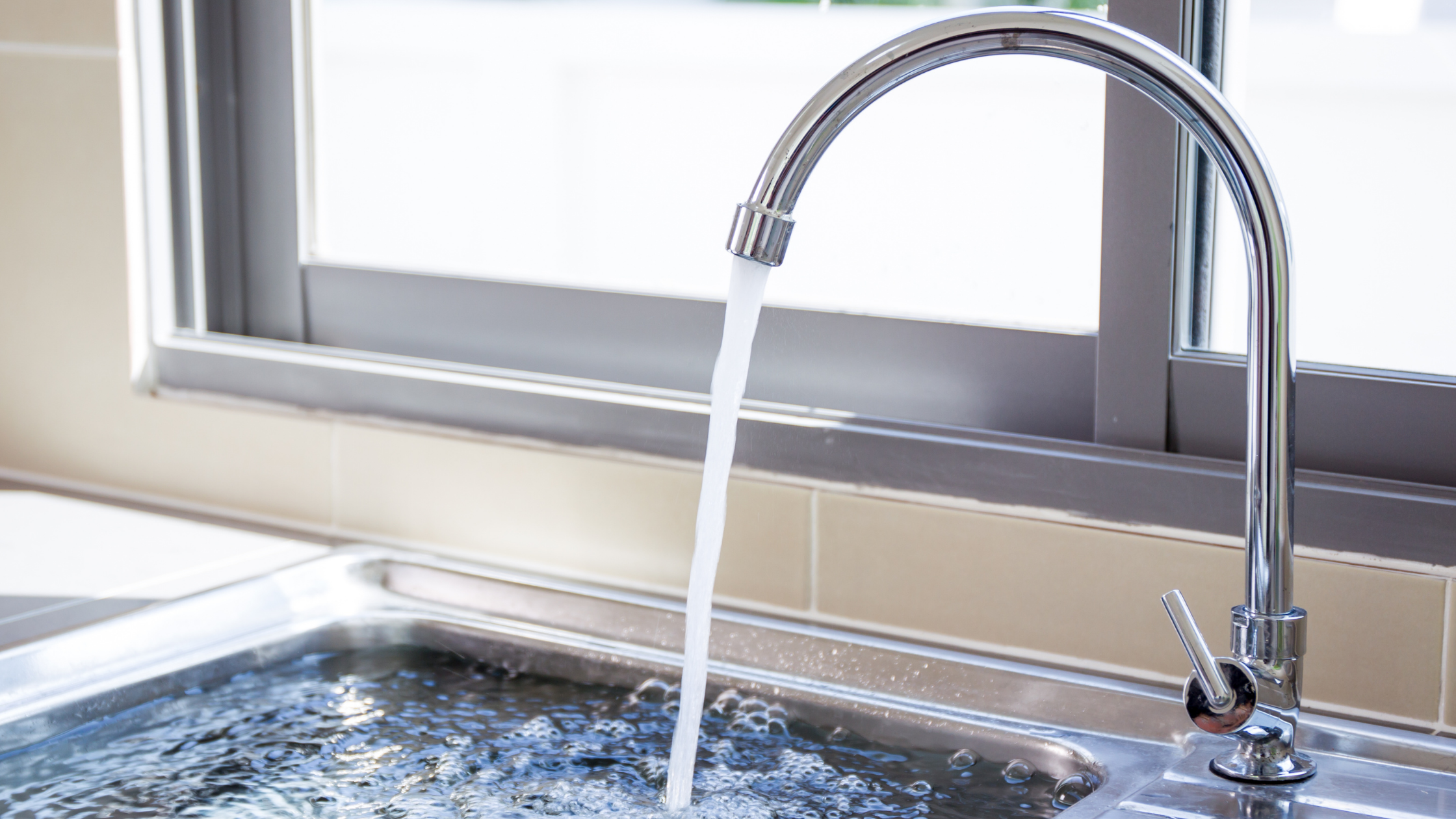 Photo of a faucet running water