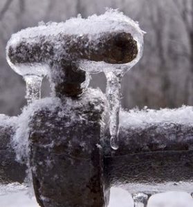 A frozen over spigot to illustrate prevent frozen pipes