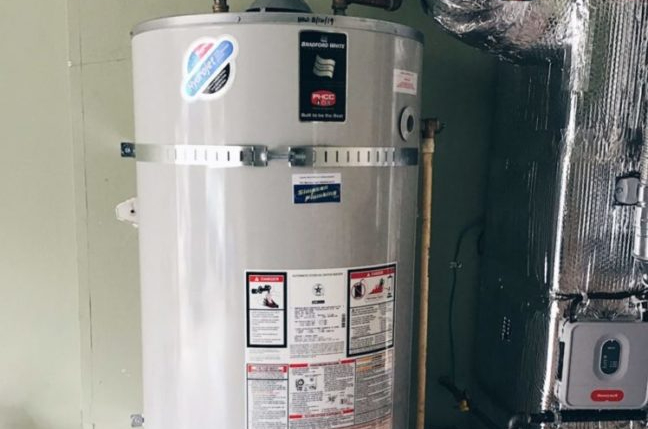 An image of a water heater to help illustrate water heater leak.